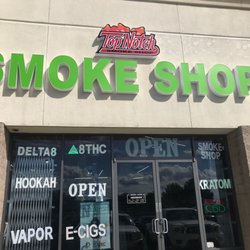 Top Notch Smoke Shop - The entrance and new sign and name