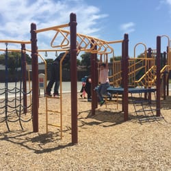 Hartnell Park - Playing on the monkey bars.