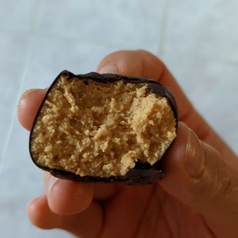 Bakin' Us Keto - Cross-section of the chocolate peanut butter ball. There's lots of filling! - Bakeries Near Me - Wellesley, Ontario