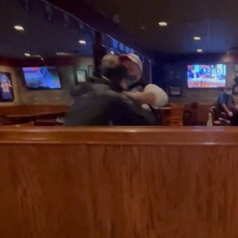 Miltons Restaurant - two people sitting at a table - Salad Near Me - Kitchener, Ontario