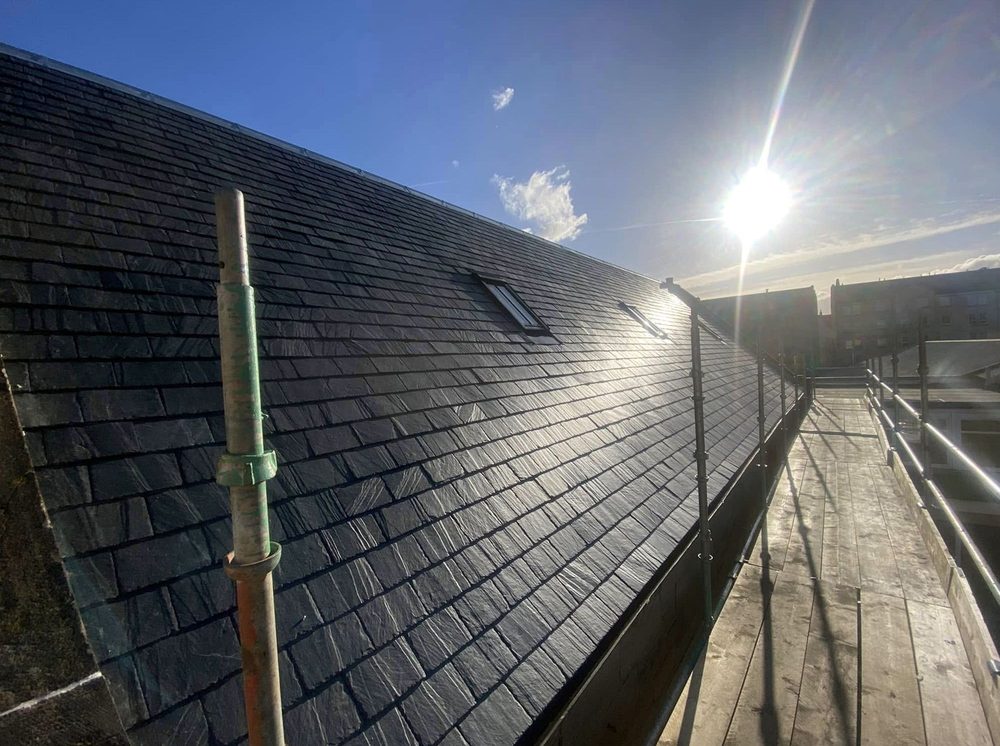 Slide of Quail Hill Roofing