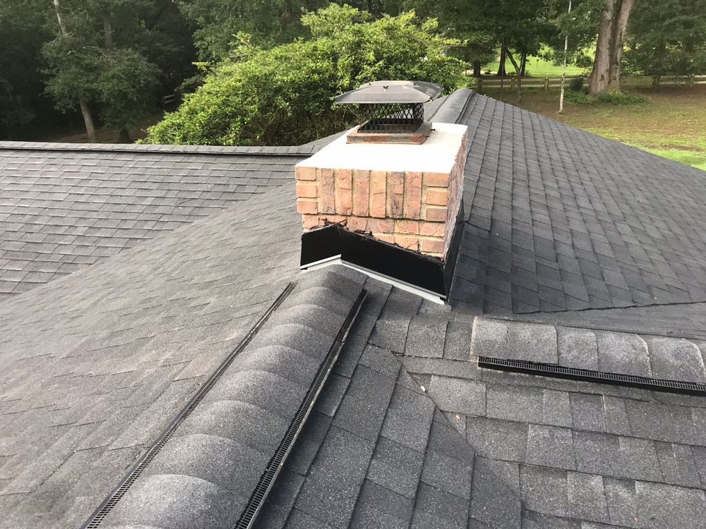 Slide of Tadlock Roofing