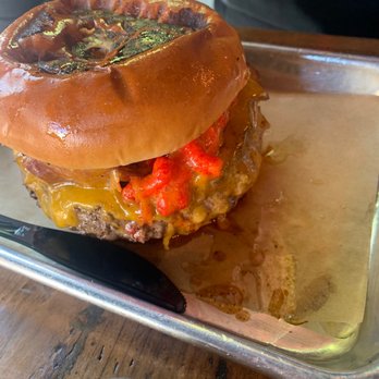 Sid's Garage - A burger with hot Cheetos that was injected with cheese at the table! - Beer Bar Near Me - Boise, Idaho Sid's Garage - A burger with hot Cheetos that was injected with cheese at the table! - Beer Bar Near Me - Boise, Idaho
