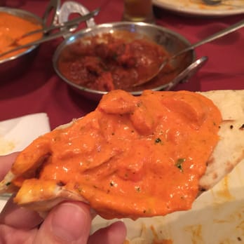 Manraj’s Kitchen - Butter chicken on garlic naan. Smooth like butta! - Indian Near Me - Auburn, Washington Manraj’s Kitchen - Butter chicken on garlic naan. Smooth like butta! - Indian Near Me - Auburn, Washington