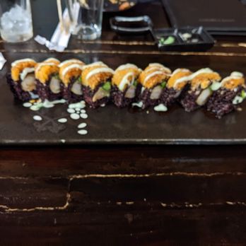 Raiz Kitchen Sushi Bar - Black Monster (I think): chewy black rice, shrimp tempura, avocado, cream cheese, with spicy crunchy mix, wasabi mayo and unagi sauce. - Sushi Bars Near Me - Chicago, Illinois Raiz Kitchen Sushi Bar - Black Monster (I think): chewy black rice, shrimp tempura, avocado, cream cheese, with spicy crunchy mix, wasabi mayo and unagi sauce. - Sushi Bars Near Me - Chicago, Illinois