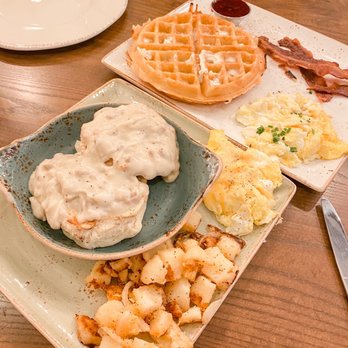 First Watch - Turkey sausage gravy and biscuits, seasoned potatoes, eggs, Belgian waffle, bacon. - Breakfast & Brunch Near Me - Chapel Hill, North Carolina