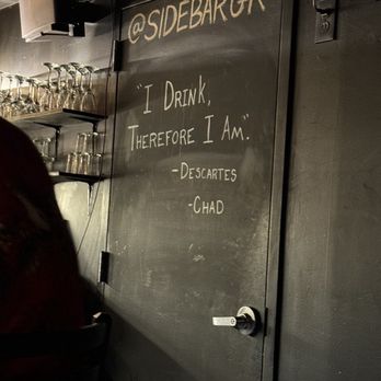 Sidebar - Door with writing on it - Cocktail Bars Near Me - Grand Rapids, Michigan