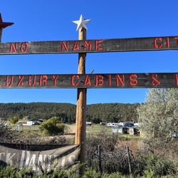 No Name City Luxury Cabins & RV - The rustic sign as you pull into the campground.