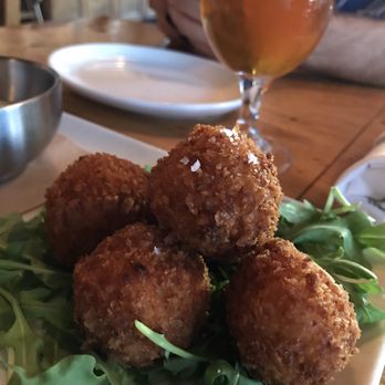 Eureka! - Fried mac n cheese balls. They arrive at your table hot, deliciously crispy and gooey on the inside. - American Near Me - Fresno, California