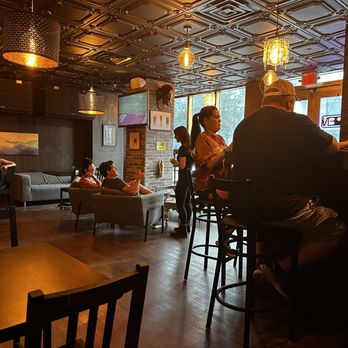 Imperial Draft Beer - people sitting at a bar - Pizza Near Me - Tampa, Florida