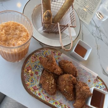 BarnYen By Thaispice - Egg rolls and hot spicy wings the perfect satisfying crunch paired perfectly with sauces! A refreshing Thai tea to pull it all together. - Thai Near Me - Pflugerville, Texas BarnYen By Thaispice - Egg rolls and hot spicy wings the perfect satisfying crunch paired perfectly with sauces! A refreshing Thai tea to pull it all together. - Thai Near Me - Pflugerville, Texas