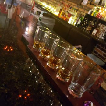 Bella Grazia - a row of glasses on a bar - Wine Bars Near Me - Winnemucca, Nevada Bella Grazia - a row of glasses on a bar - Wine Bars Near Me - Winnemucca, Nevada