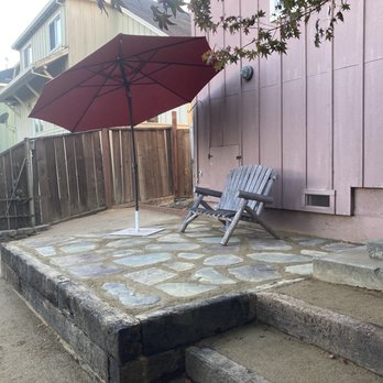 Green Earth Landscaping - Ta da! Patio and stairs in two separate tiers. - Landscaping Near Me