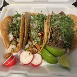 Taco Feliz - Chicken, al pastor, and steak tacos