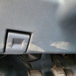 Action Auto Body - They slopped some goop on the interior of the cab near the hood release. They never addressed how or if they were going to remove it.