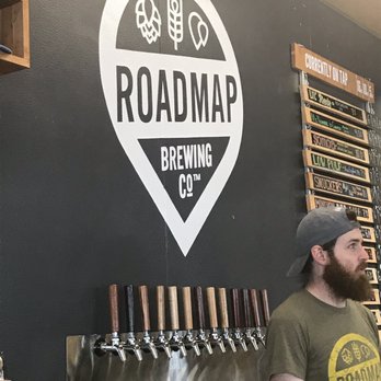 Roadmap Brewing - Logo & tap wall behind the bar - Breweries Near Me - San Antonio, Texas Roadmap Brewing - Logo & tap wall behind the bar - Breweries Near Me - San Antonio, Texas