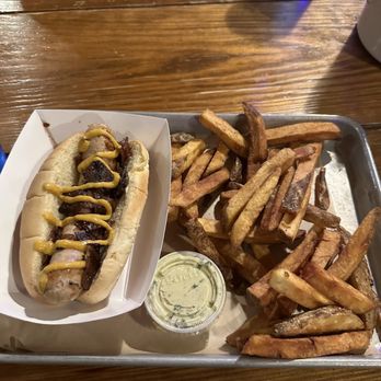 Fassler Hall - Chicken Apple Gouda sausage with 1/2 order of Duck fat fries! - Bars Near Me - Little Rock, Arkansas Fassler Hall - Chicken Apple Gouda sausage with 1/2 order of Duck fat fries! - Bars Near Me - Little Rock, Arkansas