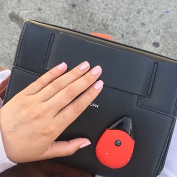 Crafty Nail Bar - Solid pink gel polish (colour #141) with a rose gold gel glitter on natural nails! In love with how it sparkles against the light. - Nail Salons Near Me - Vancouver, British Columbia