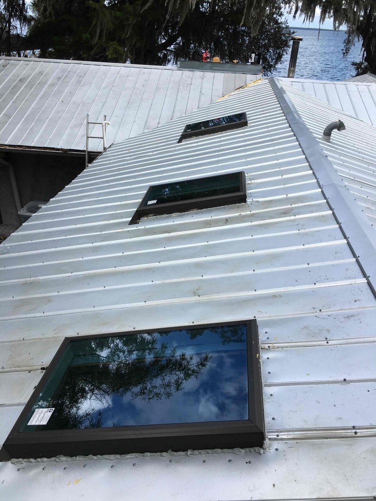 Slide of Menzel Roofing Services