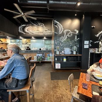 Oni Ramen - a man and a woman sitting at a table - Ramen Near Me - Richardson, Texas