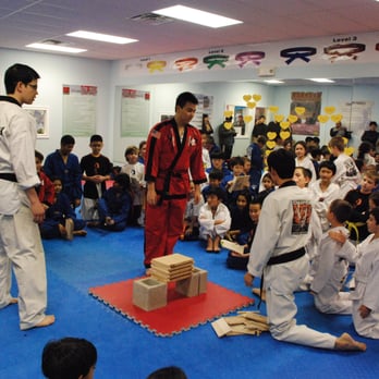 Max Martial Arts - Breaking for belt promotion - Self-defense Classes Near Me - Niles, Illinois Max Martial Arts - Breaking for belt promotion - Self-defense Classes Near Me - Niles, Illinois