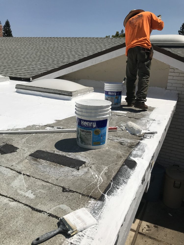 Slide of J V Roofing