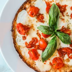 Umberto's Restaurant & Pizza - Gluten Free Cauliflower Crust Pizza With Smoked Mozzarella & Fresh Cherry Tomatoes