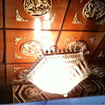 China Doll Restaurant - The ceiling features these cool unset wooden/golden tiles and a chandelier. - Chinese Near Me - Houston, Texas China Doll Restaurant - The ceiling features these cool unset wooden/golden tiles and a chandelier. - Chinese Near Me - Houston, Texas
