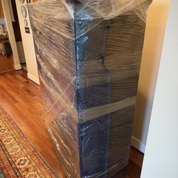 RMP Moving - Wrap antique hutch - Movers Near Me
