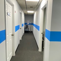 Middle River HealthCare - The hallway of the lab, exam rooms 1-3 and the vital station