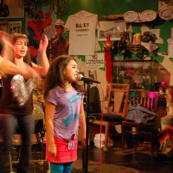 One of my Jr. rockers doing her 1st open mic night at 7YO!