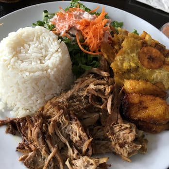Sofrito Latin Cafe - Roast Pork, white rice, tostones, and sweet plantains - Latin American Near Me - Orlando, Florida Sofrito Latin Cafe - Roast Pork, white rice, tostones, and sweet plantains - Latin American Near Me - Orlando, Florida