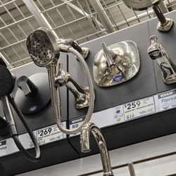 Lowe's Home Improvement - Looking at some shower heads