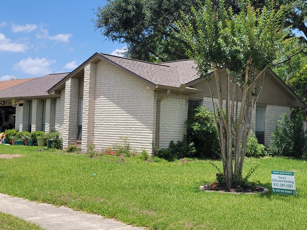 Slide of Dave's Discount Roofing