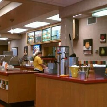 Runza Restaurants - a woman at the counter - Burgers Near Me - Lincoln, Nebraska Runza Restaurants - a woman at the counter - Burgers Near Me - Lincoln, Nebraska