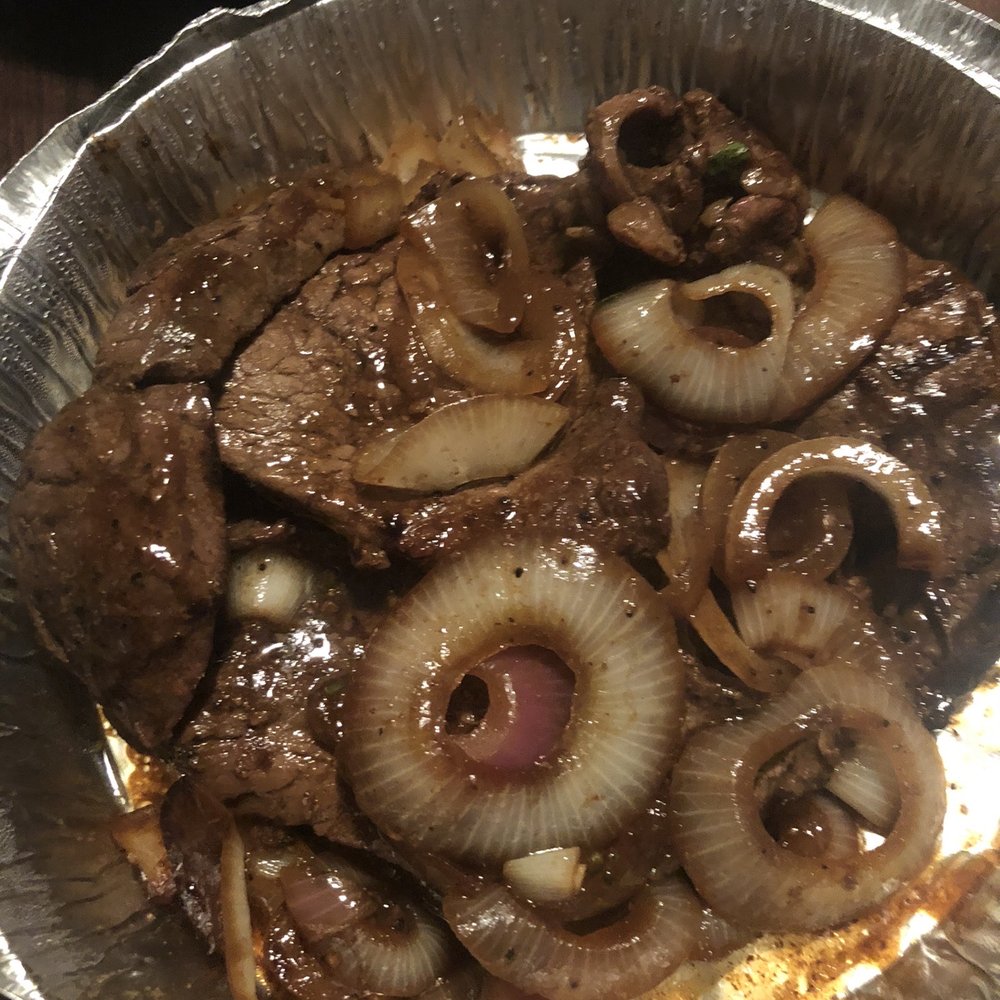 Bistec encebollado Bistec encebollado