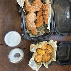 Wingstop - 5 piece garlic Parmesan tenders, bleu cheese, fried corn, 20oz Softdrink.