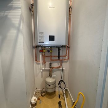 Water Heater Doctor - Rinnai RXP199in tankless water heater prior to running venting thru roof - Plumbing Near Me - Irvine, California Water Heater Doctor - Rinnai RXP199in tankless water heater prior to running venting thru roof - Plumbing Near Me - Irvine, California