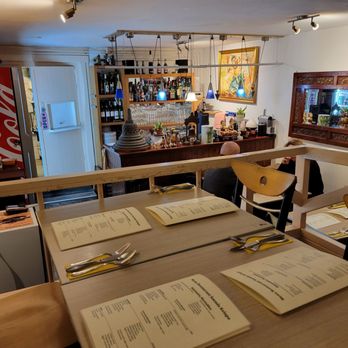 Soenda Kelapa - Seating area downstairs (more tables upstairs). - Indonesian Near Me - Amsterdam, New Hampshire Soenda Kelapa - Seating area downstairs (more tables upstairs). - Indonesian Near Me - Amsterdam, New Hampshire