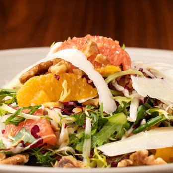 Otium Grill and Greens - a salad with oranges and walnuts - Bars Near Me - Seattle, Washington