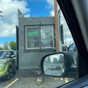 Happy Juice - a green car parked in front of a building - Coffee & Tea Near Me - Vancouver, Washington