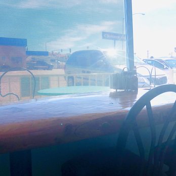 Happyplace Subs - Wood surfboard as a table. - Sandwiches Near Me - Bullhead City, Arizona
