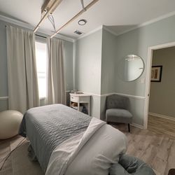 New Bridge Holistic Center - Private Ashiatsu massage room in Jacksonville, NC. Calm, clean space for deep tissue, pain relief, and relaxation massage.