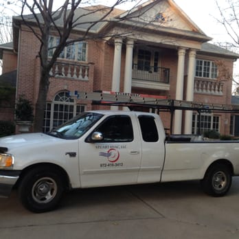 STUART HVAC - Picture of one of our service trucks in front of one of our customers home. - Heating & Air Conditioning/HVAC Near Me STUART HVAC - Picture of one of our service trucks in front of one of our customers home. - Heating & Air Conditioning/HVAC Near Me