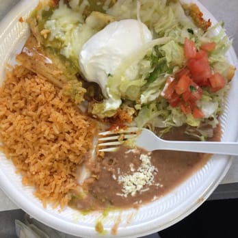 El Mexicano - Tamales were topped with gooey cheese. - Mexican Near Me - Moline, Illinois El Mexicano - Tamales were topped with gooey cheese. - Mexican Near Me - Moline, Illinois