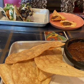 Lime & Salt Taco Bar - Salsa tatemada with half-tortilla totopos, a portobello taco, and a camarones a la diabla taco, with fresh-made toppings - Tacos Near Me - Columbia, Maryland Lime & Salt Taco Bar - Salsa tatemada with half-tortilla totopos, a portobello taco, and a camarones a la diabla taco, with fresh-made toppings - Tacos Near Me - Columbia, Maryland
