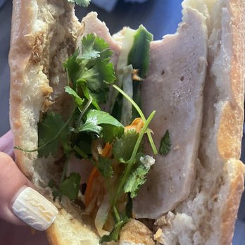 Lynda Sandwich - One piece of meat, some sprigs of cilantro, 3 strands of carrot pickles, and they call it a day. - Sandwiches Near Me - San Jose, California Lynda Sandwich - One piece of meat, some sprigs of cilantro, 3 strands of carrot pickles, and they call it a day. - Sandwiches Near Me - San Jose, California