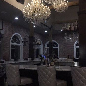 Marais - Beautiful lighting over one of the bars. - Seafood Near Me - Dickinson, Texas