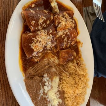 Cinco De Mayo Taqueria - Enchiladas (pork, chicken, shrimp), rice and beans - Mexican Near Me - Manhattan, Kansas Cinco De Mayo Taqueria - Enchiladas (pork, chicken, shrimp), rice and beans - Mexican Near Me - Manhattan, Kansas