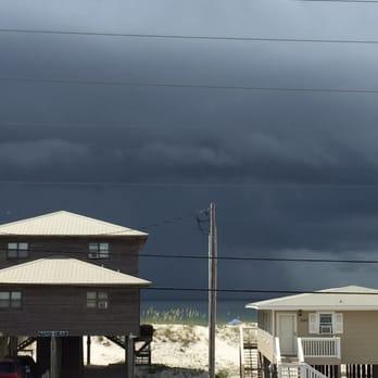 Camp David Beach House - From front porch with storms coming. - Vacation Rentals Near Me - Gulf Shores, Alabama Camp David Beach House - From front porch with storms coming. - Vacation Rentals Near Me - Gulf Shores, Alabama